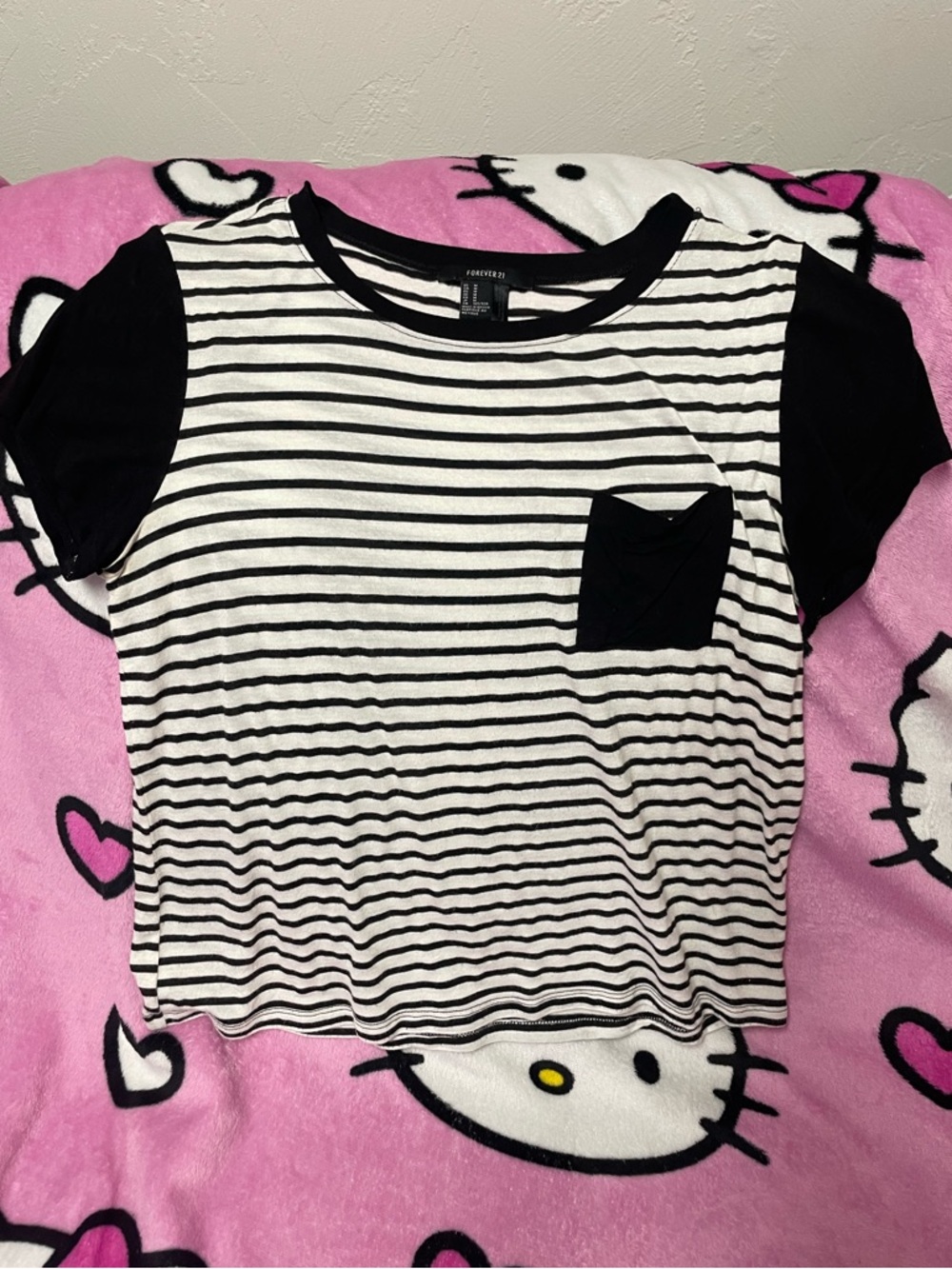 black and white striped top with pocket